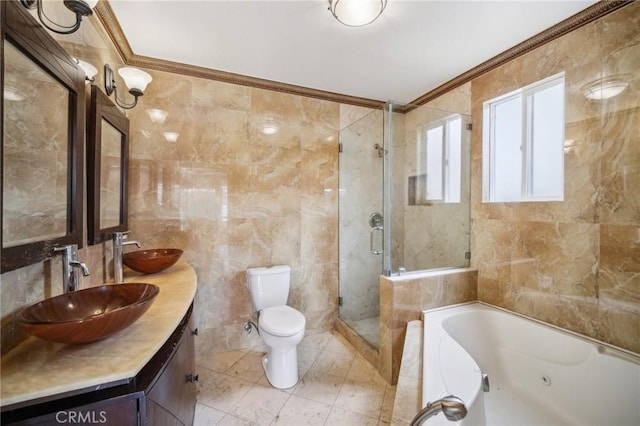 full bathroom with crown molding, separate shower and tub, tile walls, and vanity