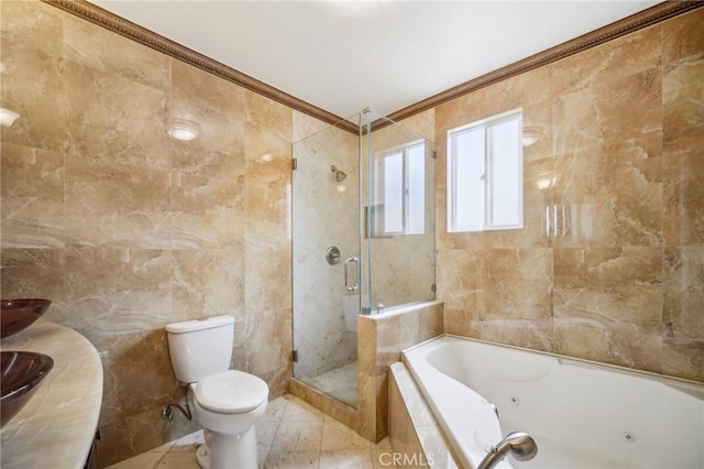 full bathroom with tile walls, separate shower and tub, vanity, ornamental molding, and toilet