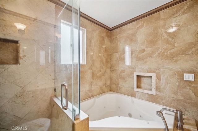 bathroom with ornamental molding, separate shower and tub, and tile walls