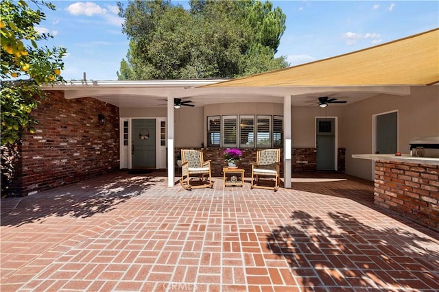 view of patio / terrace with ceiling fan