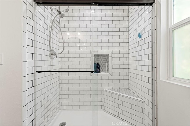 bathroom with an enclosed shower