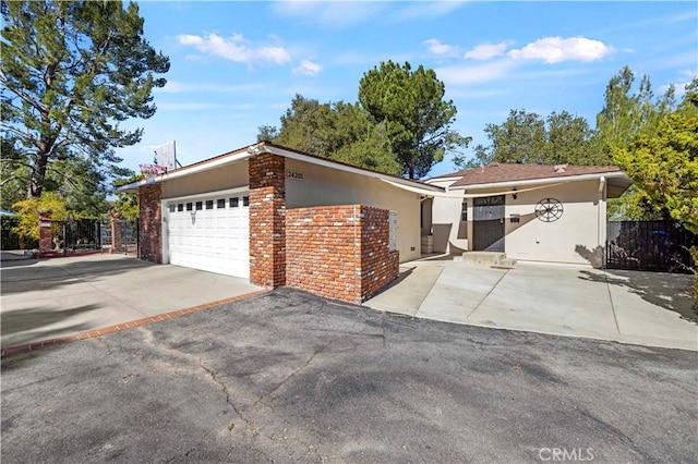 ranch-style house featuring a garage