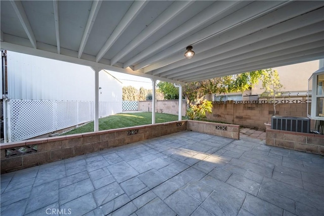 view of patio with a fenced backyard and central AC