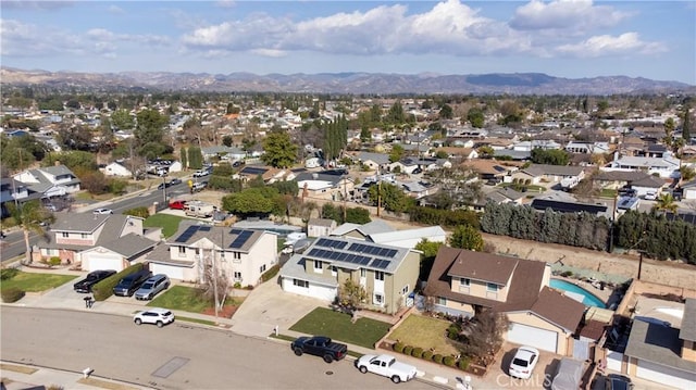 aerial view featuring a residential view and a mountain view