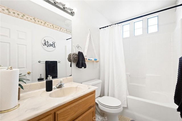 full bathroom featuring vanity, shower / tub combo, and toilet