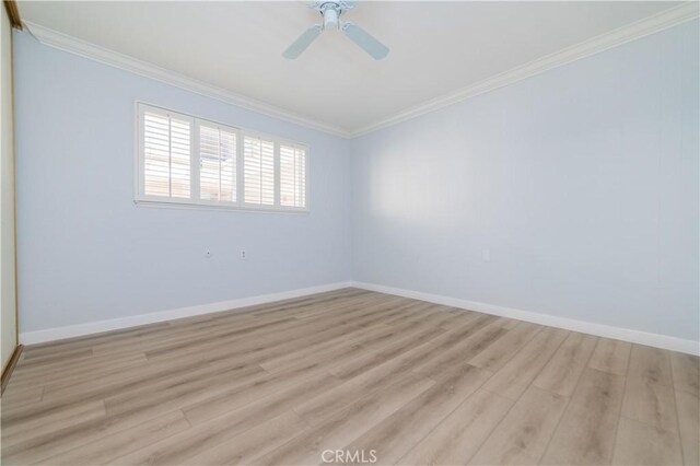 2381 Via Mariposa W Unit 2C, Laguna Woods, CA 92637 - empty room with crown molding, light wood finished floors, baseboards, and a ceiling fan
