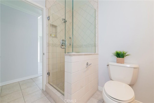 2381 Via Mariposa W Unit 2C, Laguna Woods, CA 92637 - full bath featuring a shower stall, baseboards, and tile patterned floors