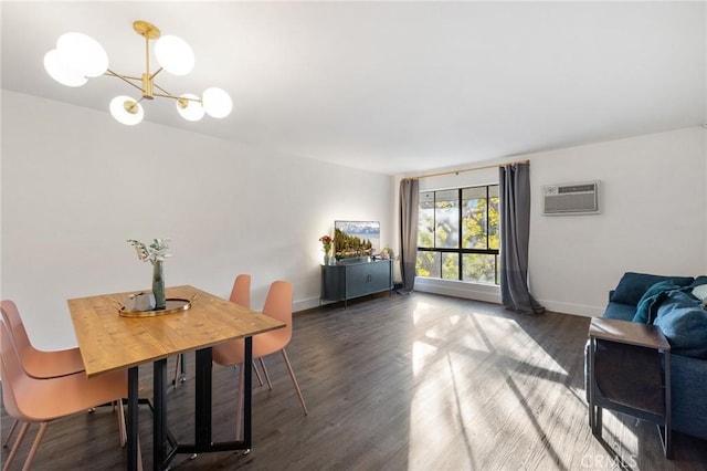 dining room with an inviting chandelier, dark hardwood / wood-style floors, and an AC wall unit