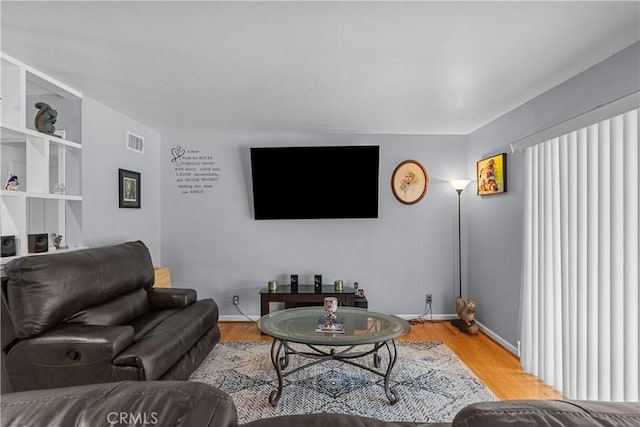 living room with wood-type flooring