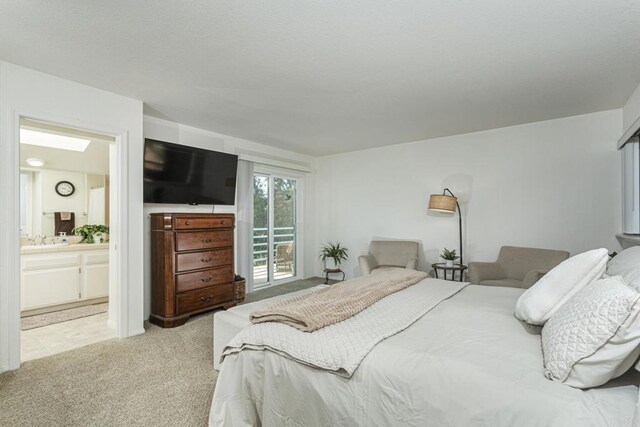 656 Westlake St, Encinitas, CA 92024 - bedroom featuring light carpet, a sink, and ensuite bathroom
