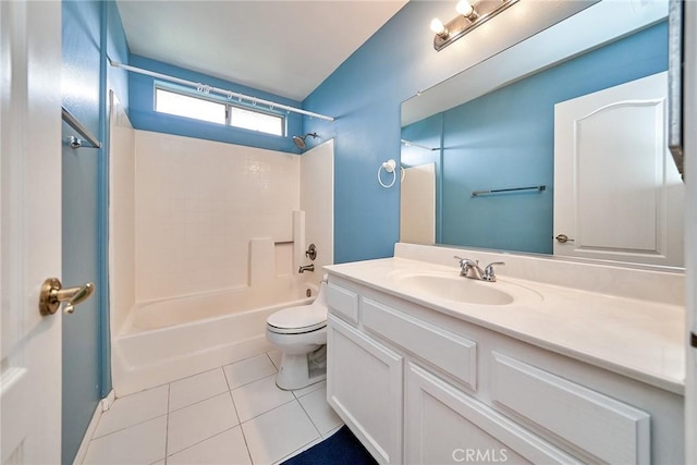 full bathroom featuring tile patterned floors, toilet, bathing tub / shower combination, and vanity