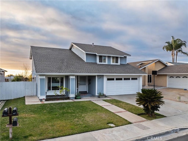 front of property featuring a yard and covered porch