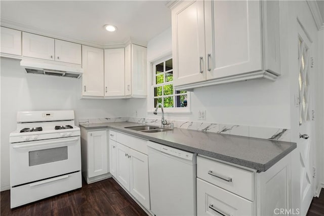 kitchen with white cabinetry, sink, and white appliances