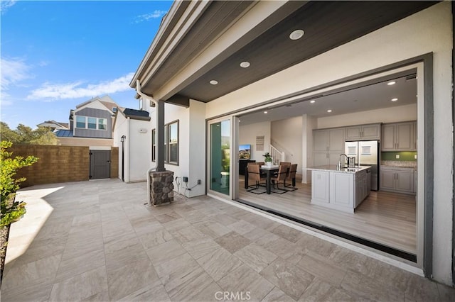 view of patio featuring sink