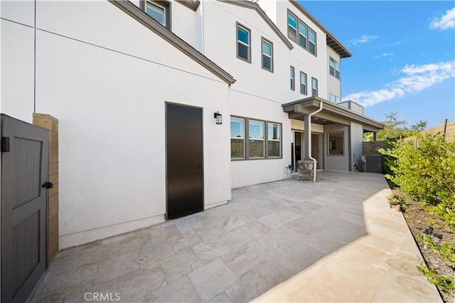 rear view of house featuring a patio