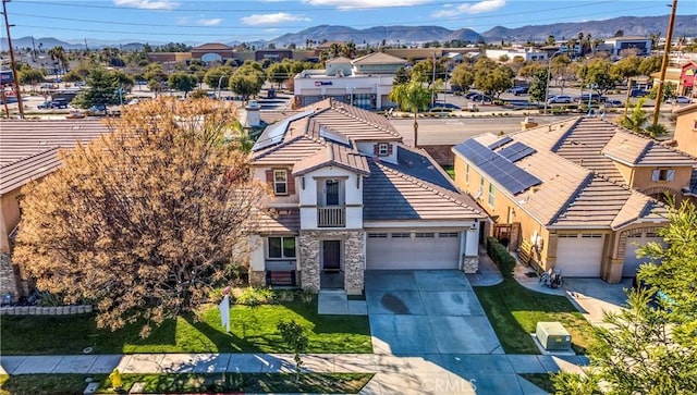 aerial view featuring a residential view and a mountain view