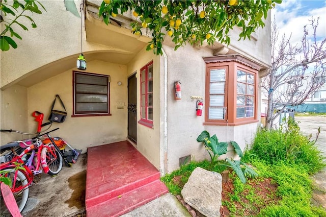 doorway to property with a patio