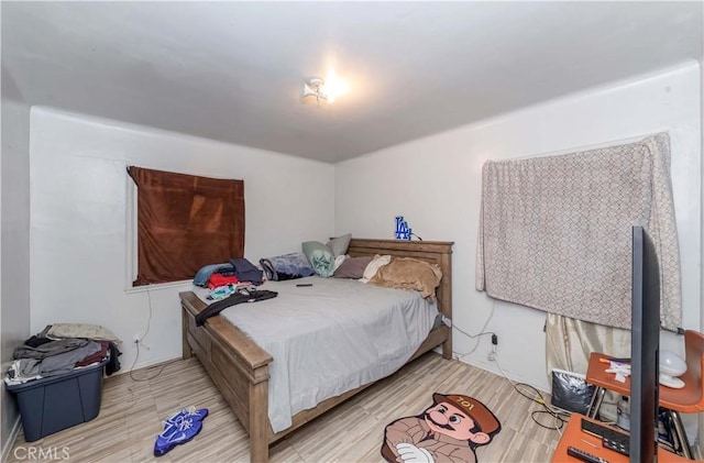 bedroom featuring light hardwood / wood-style flooring