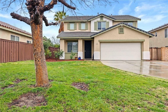 view of front of home featuring a garage and a front lawn