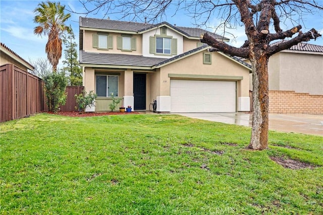 view of front of property featuring a garage and a front lawn