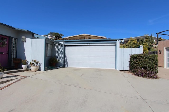 view of side of home with a garage