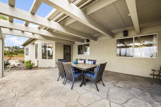 view of patio / terrace with outdoor dining area and a pergola