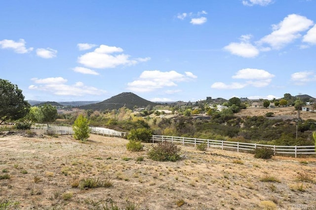 property view of mountains featuring a rural view