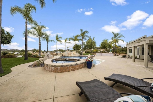 exterior space with a patio and a hot tub