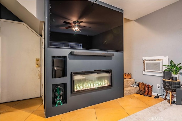 room details with light tile patterned floors, a fireplace, and ceiling fan