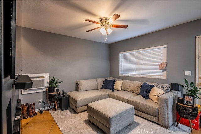 tiled living room with ceiling fan