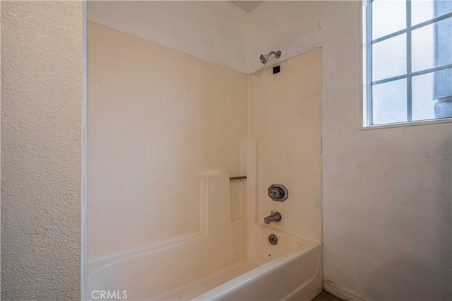 bathroom featuring shower / bath combination