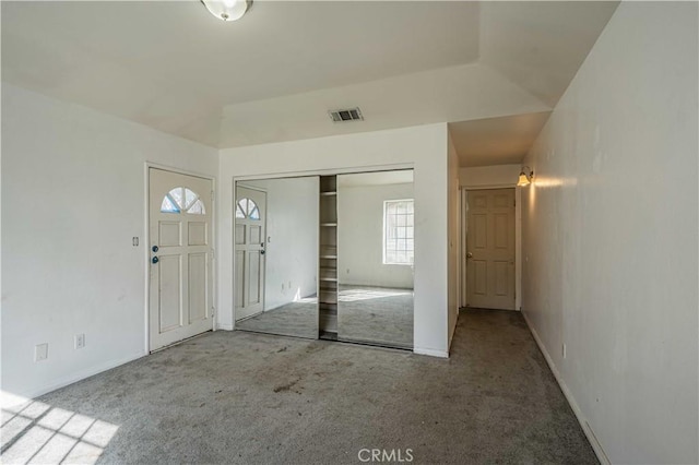 entryway featuring carpet flooring