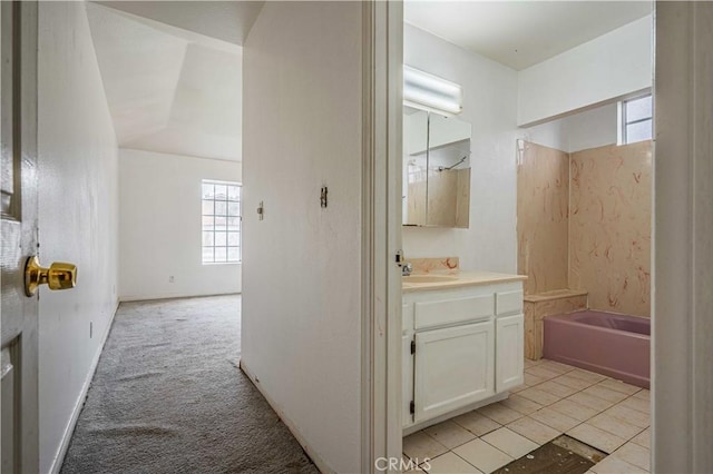 bathroom with vanity and bathtub / shower combination