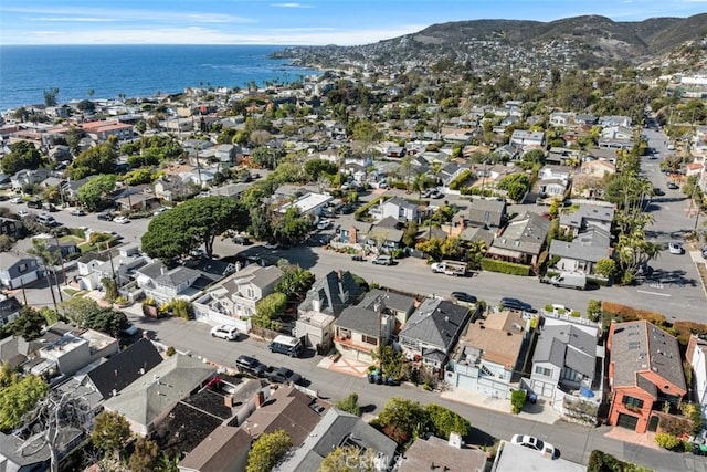 aerial view featuring a water and mountain view