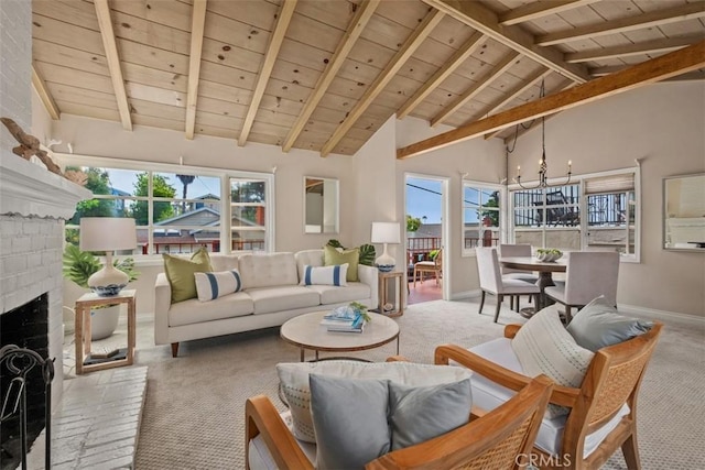 551 Anita St, Laguna Beach, CA 92651 - carpeted living area with wooden ceiling with exposed beams, baseboards, a brick fireplace, and high vaulted ceiling