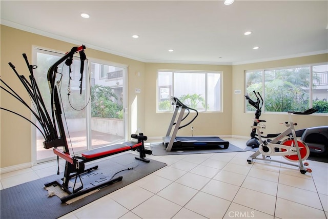 workout area with light tile patterned floors and ornamental molding