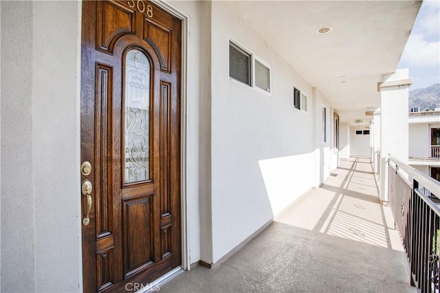 doorway to property with a mountain view