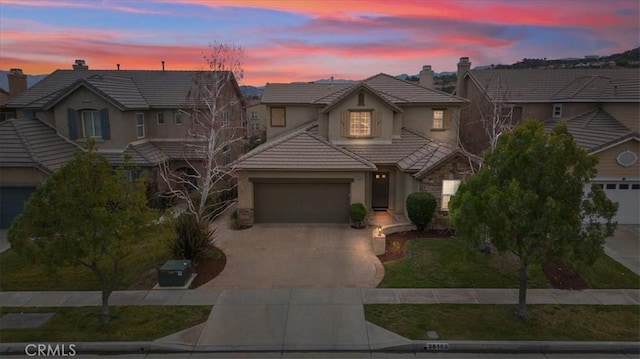 view of front of home with a garage