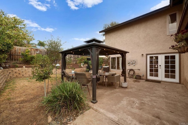 view of patio with a gazebo and french doors