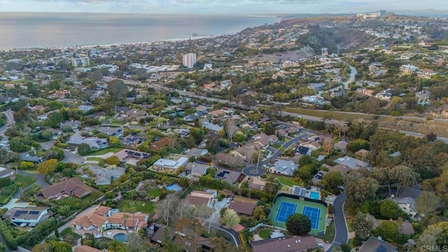 bird's eye view featuring a residential view and a water view