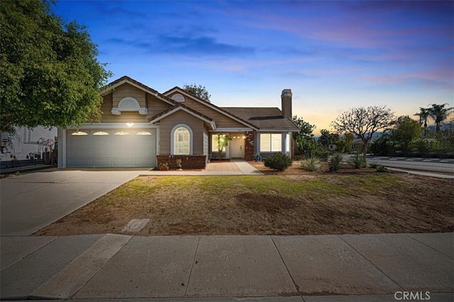 view of front of home with a garage