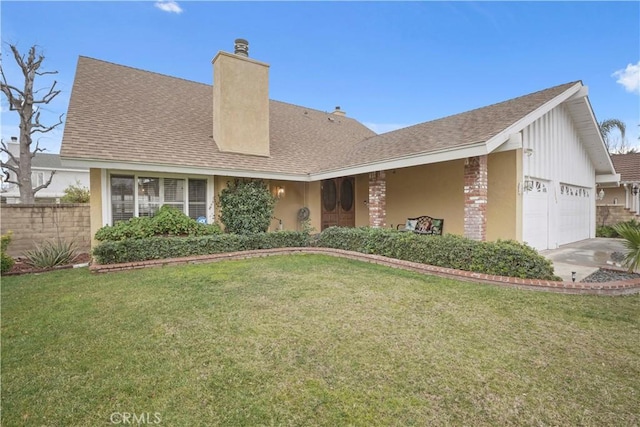 view of front facade featuring a garage and a front yard