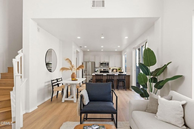 living room featuring light wood-type flooring