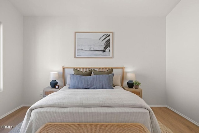 bedroom with light hardwood / wood-style flooring