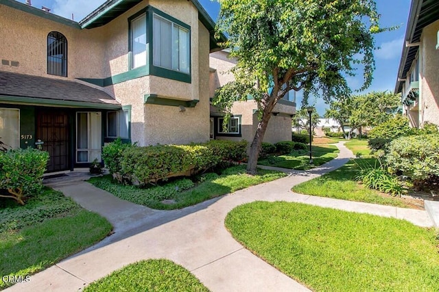 exterior space featuring a lawn