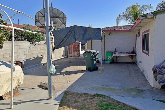 view of patio with fence