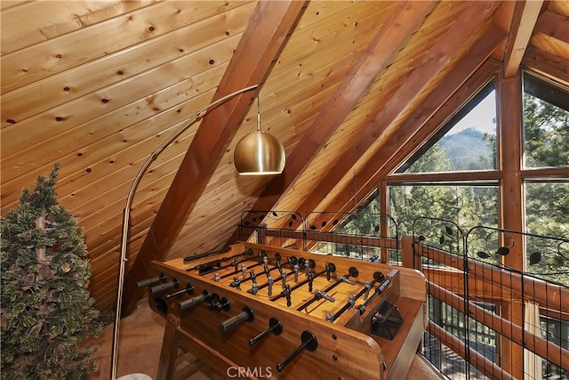 wine area with lofted ceiling with beams and wooden ceiling