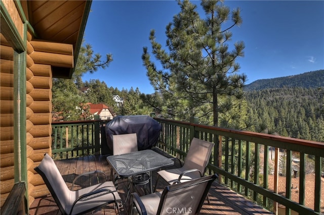 deck featuring area for grilling and a mountain view