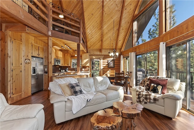 living room featuring high vaulted ceiling, dark wood-type flooring, wooden ceiling, and an inviting chandelier