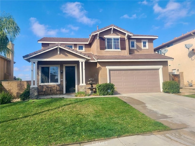 view of front of home with a garage, concrete driveway, a front lawn, and stucco siding